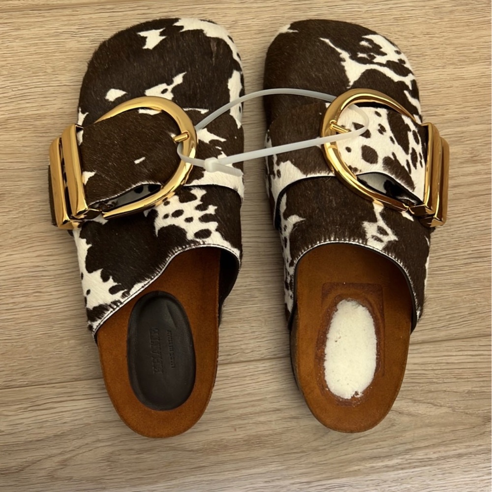 Khaite downing cow print buckle mules